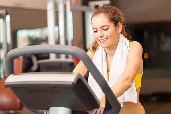 Woman training in fitness club