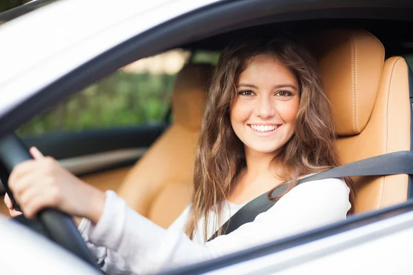 Woman driving her car