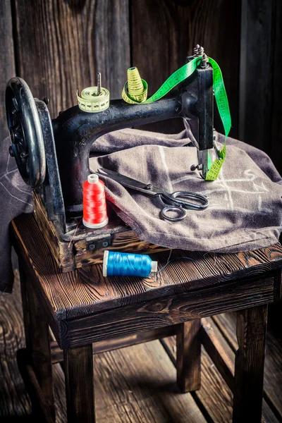 Tailor machine with tailor tape, needle and threads