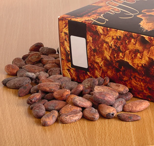 Cocoa beans and a box of chocolates