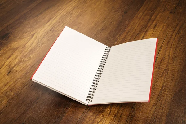 Note book on a wooden desk