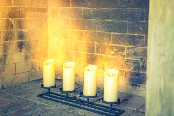 Fireplace with decorative candles .  ( Filtered image processed