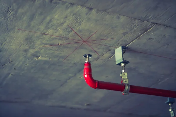 Fire sprinkler and red pipe