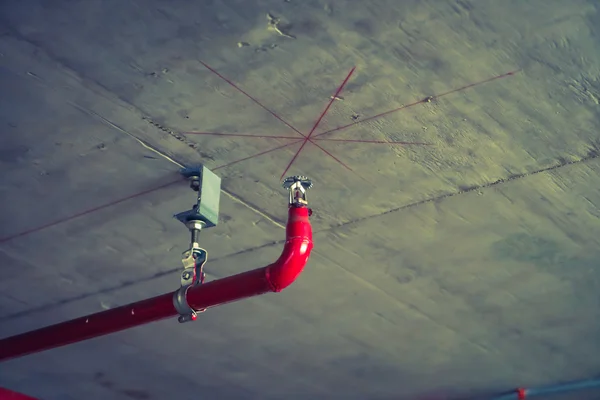 Fire sprinkler and red pipe