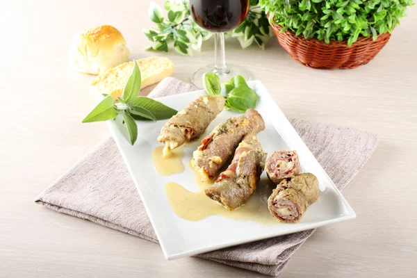 Meat rolls stuffed with bacon and cheese