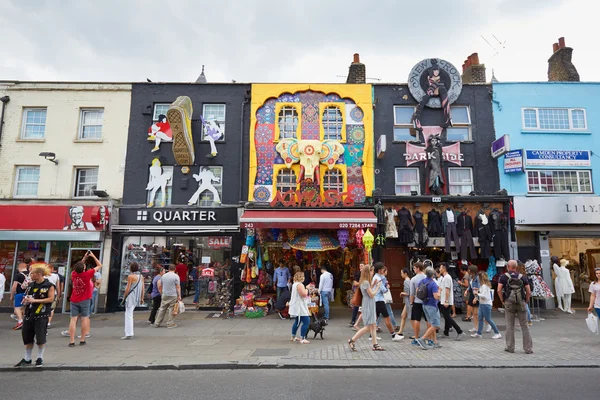 Camden Town colorful shops with people in the street in London