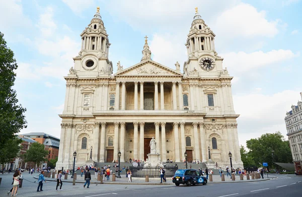 St Paul\'s cathedral facade with people in London