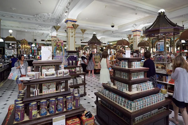 Harrods department store interior, candies and sweets area, in London