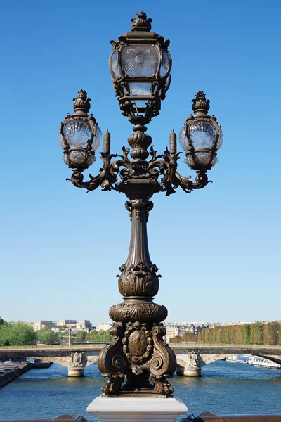 Ancient street lamp in Paris, Alexander III bridge