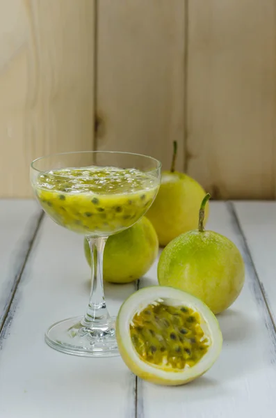 Fresh passion fruit juice in glass
