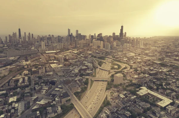 Aerial highway view against Chicago skyline- vintage effect