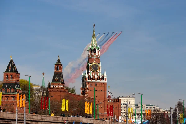 MOSCOW - MAY 9: Jets with colored smoke fly overhead during the