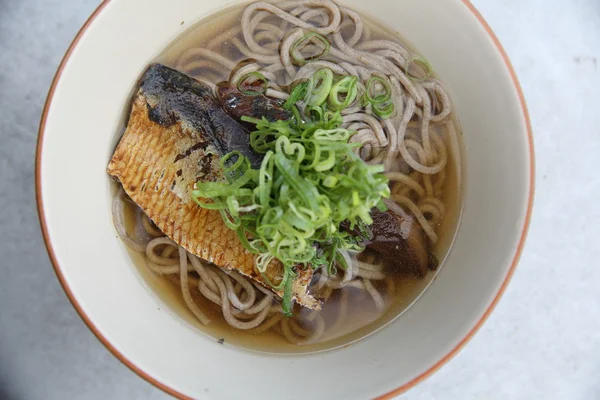 Hot soba noodle with mackerel fish , japanese noodle food