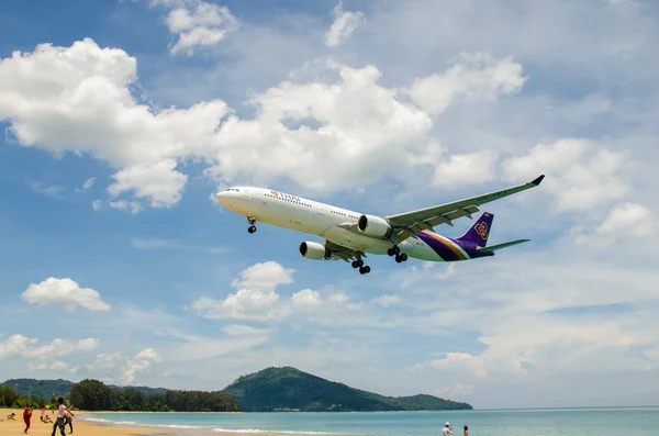 Thai Airways airplane landing at Phuket International airport