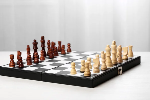 Chess pieces and game board