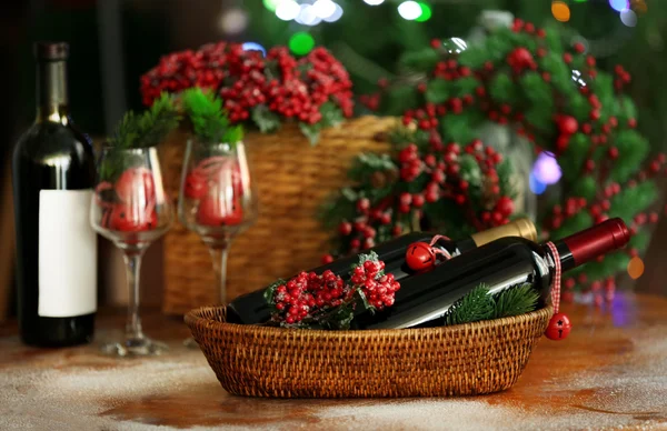 Wine in wicker bowl and Christmas decor