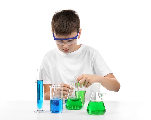 Boy doing chemical experiments
