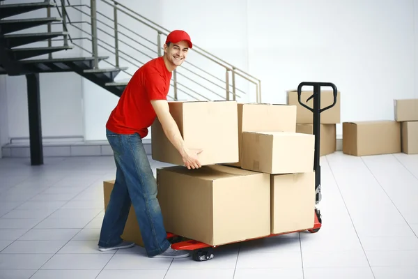 Delivery man with hand truck