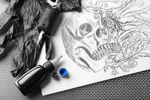 Tattoo machine, sketch and tattoo supplies
