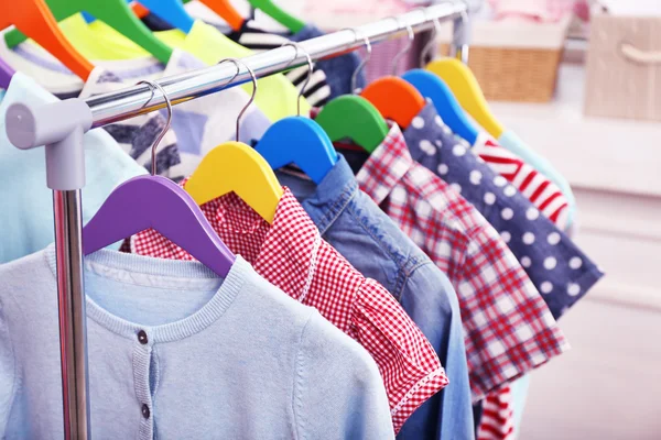 Clothes for children on hangers