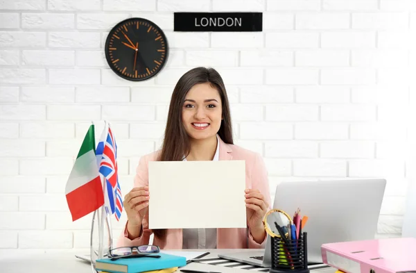 woman in the office of travel company