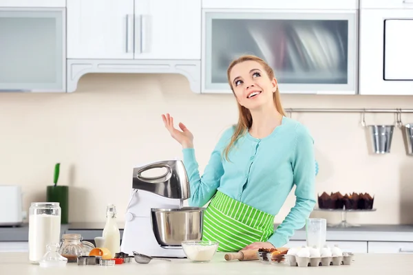 Woman waiting for food processor