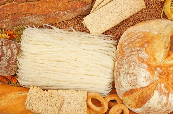 Various types of bread and pasta, top view