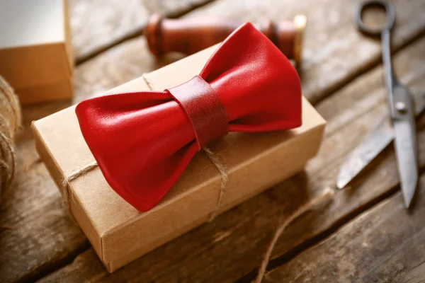 Bow tie on wooden table
