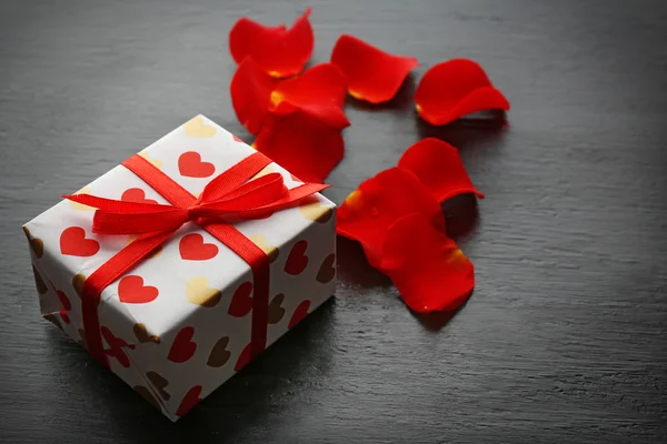 Gift box, rose petals