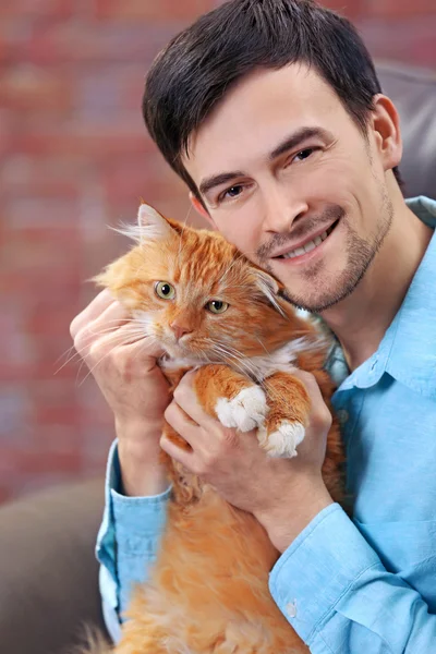 Man with fluffy cat