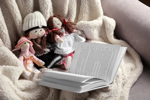 Rag dolls with fairy tales book