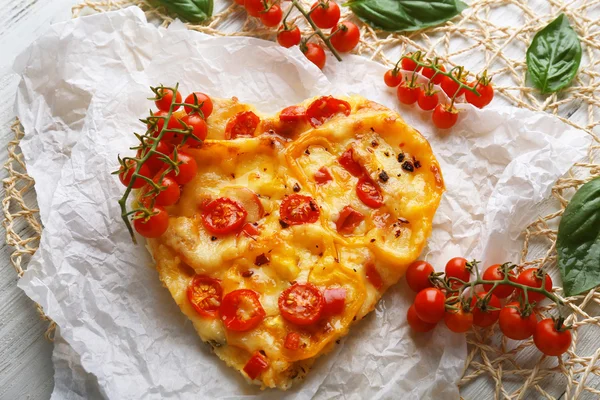 Heart shaped decorated pizza