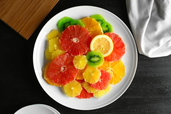 Plate of fresh peeled and sliced citrus