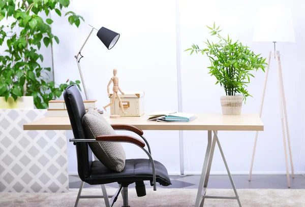 Workplace with table, office chair