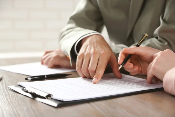 Human hands working with documents