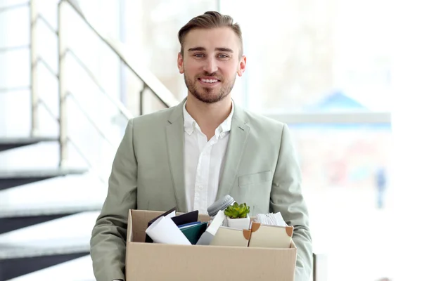Businessman with moving box