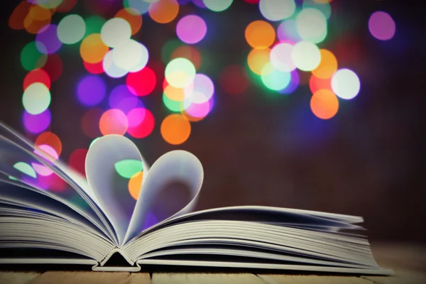 Sheets of book curved into heart shape