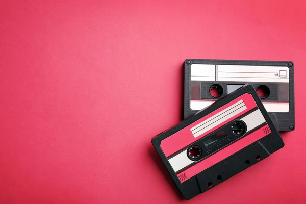 Old audio cassettes on red