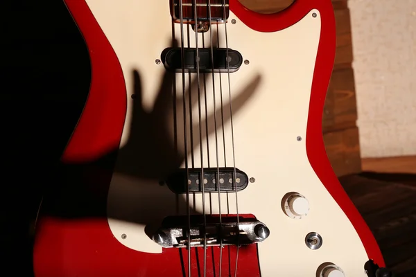 Electric guitar with shadow hand