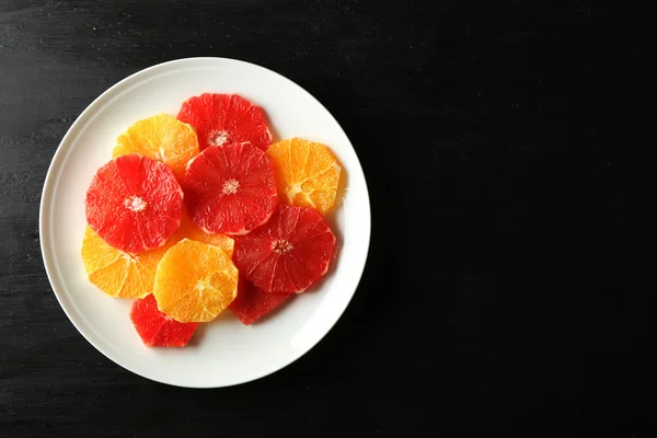 Plate of fresh peeled and sliced citrus