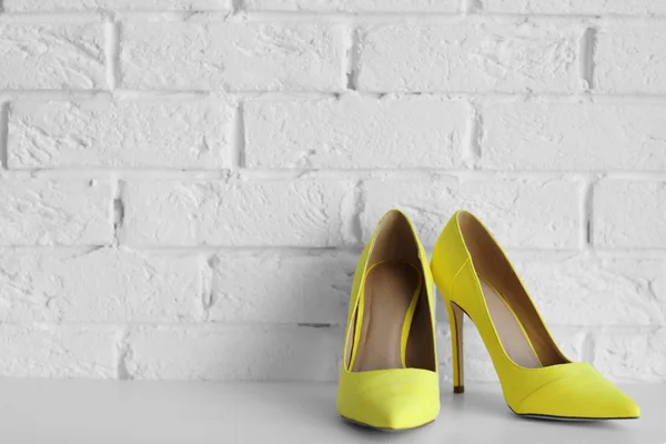 Yellow woman high heels