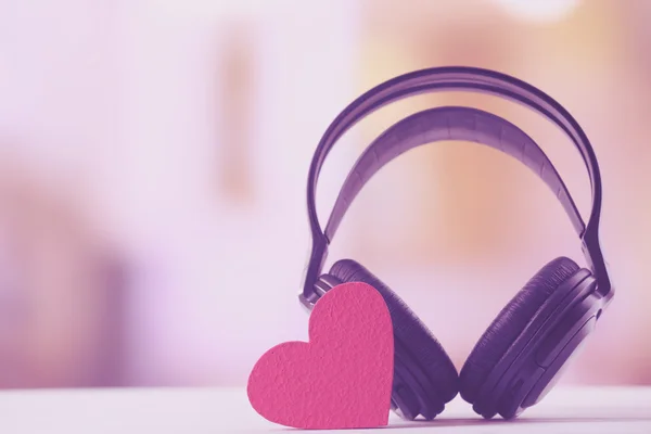 Black headphones with heart