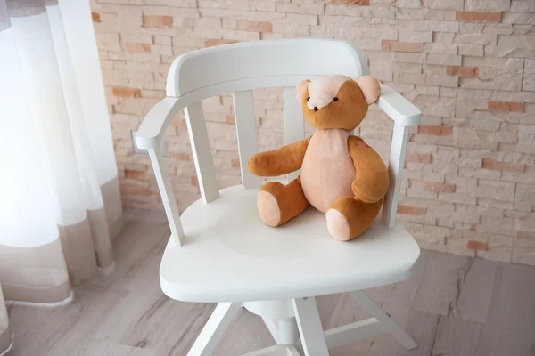 Kid\'s toy on the chair