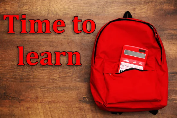 Red Backpack and calculator