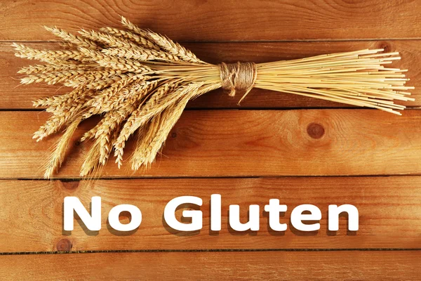 Spikelets of wheat and text No Gluten