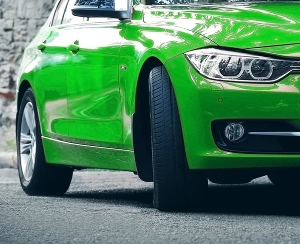 Green moving car