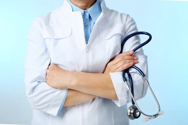Professional doctor with stethoscope