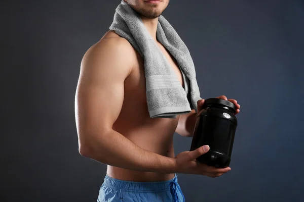 Young man with sports nutrition