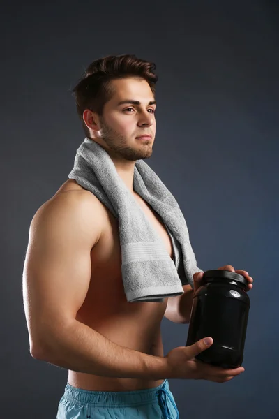 Young man with sports nutrition