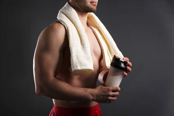 Young man with sports nutrition